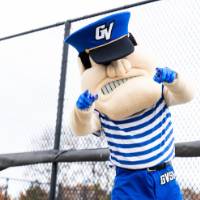 Louie points at the camera